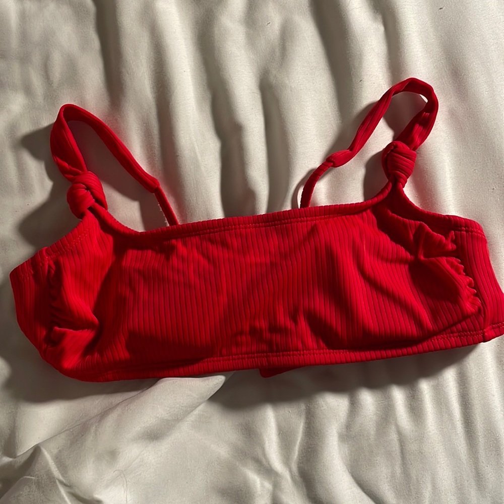 women’s red bikini top, size M, runs tight